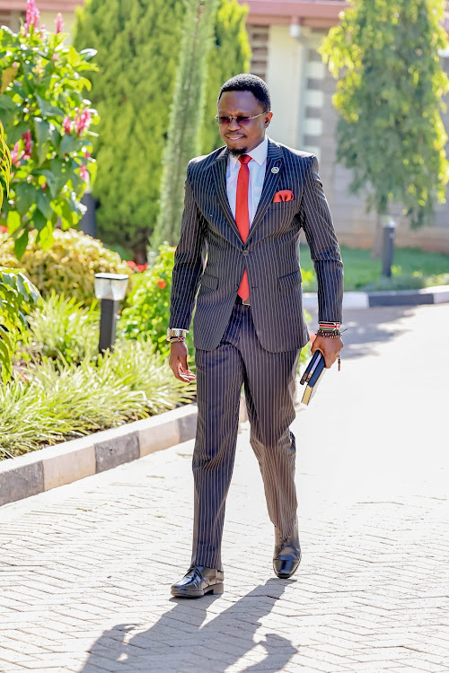 Sports Cabinet Secretary Ababu Namwamba walking to the meeting held at DP Gachagua Karen residence on March 12, 2024.