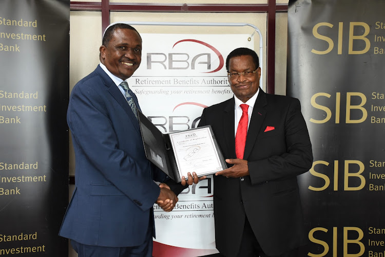 RBA CEO Charles Machira with SIB managing director James Wangunyu during the issuance of the license.