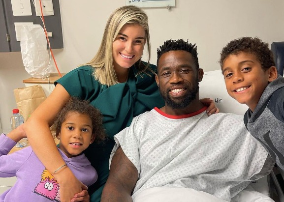 Siya Kolisi pictured with his wife Rachel and their children after undergoing an operation.