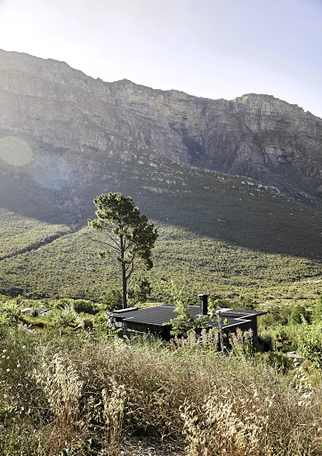 The cabin was positioned to make the most of the views, and designed to fade into the landscape.