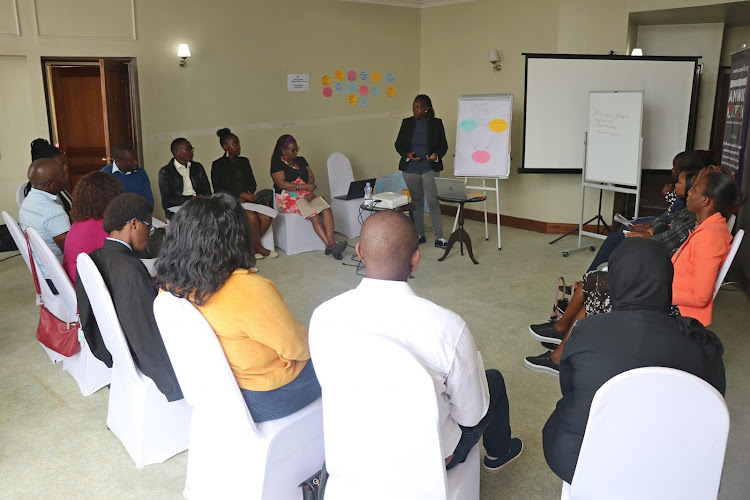 The Association of Media Women in Kenya programmes officer Lillian Museka during reporting on Online Violence Against Women workshop at a Nairobi hotel on December 6, 2022.