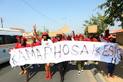 EFF supporters from Zandspruit and Honeydew intensify their call for the president's resignation as they participate in the national shutdown in Cosmo City. 