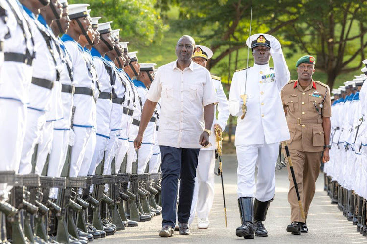 President William Ruto inspecting a guard on honor of the Kenyan Navy on July 29, 2023