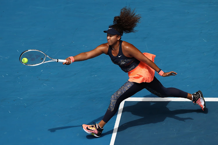 Naomi Osaka of Japan plays a forehand against Su-Wei Hsieh of Chinese Taipei during day nine of the 2021 Australian Open at Melbourne Park on February 16, 2021