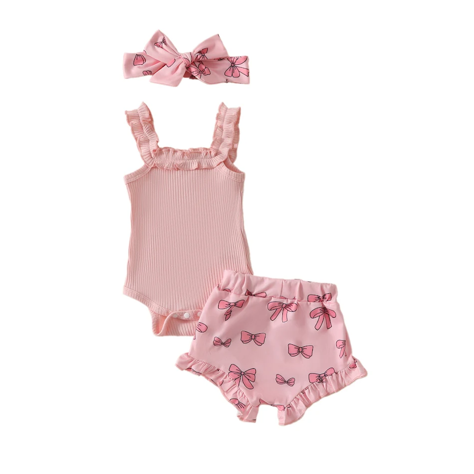 Ensemble deux pièces pour filles, barboteuse unie avec nœud et short. Confort et style pour les journées ensoleillées, parfait pour jouer dehors et être à l'aise.