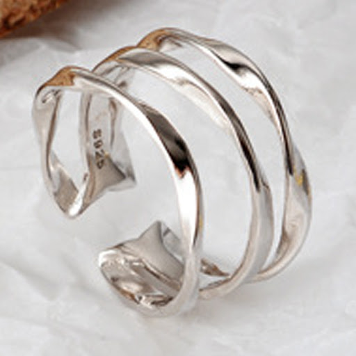 Title 7, Sterling Silver Three-layer Twisted Ring. A ver...