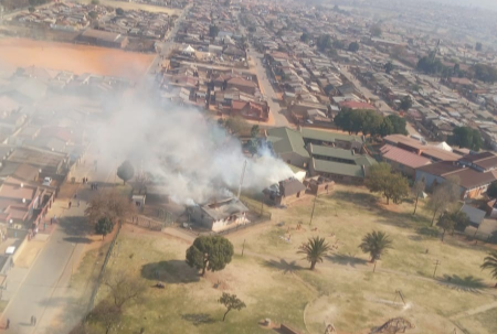 A government building was torched by Thembisa protesters on Monday. The death toll from protests in the area has reached four.