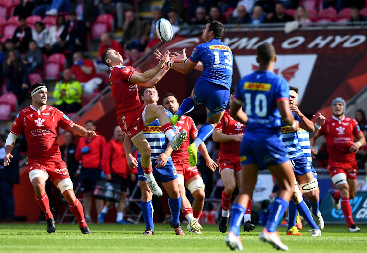 The Stormers' Ruhan Nel flying high with the Scarlets' Gareth Davies in a URC match.