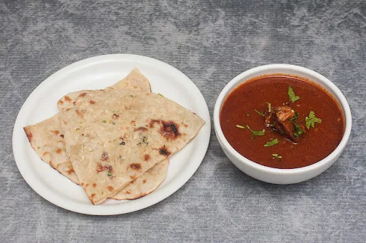 Mutton Curry (1 Pc) + 1 Butter Naan / 1 Laccha Paratha
