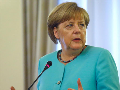 German Chancellor Angela Merkel gestures during a news conference in Addis Ababa, Ethiopia, October 11, 2016. /REUTERS