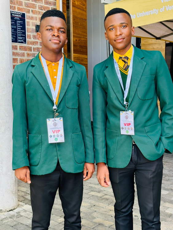 Top performers Menzi Mbimbili, left, and Siyabonga Vuma were the toast of their school.