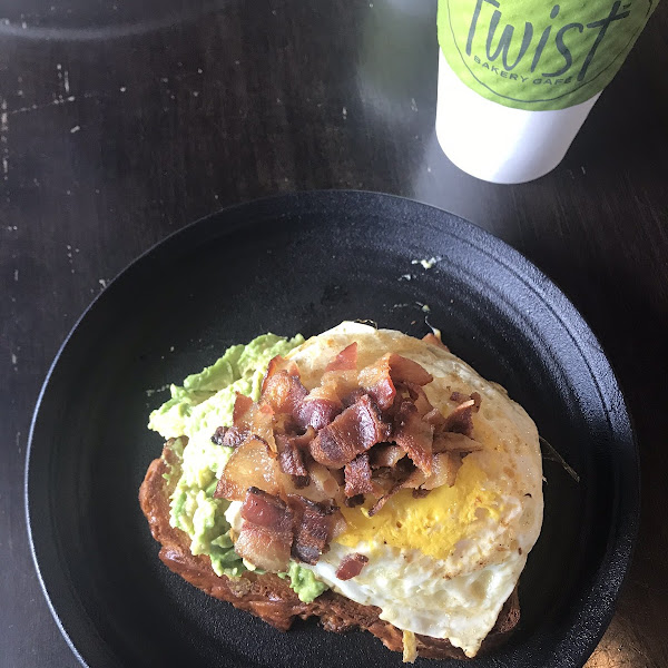 Avocado toast with bacon and eggs