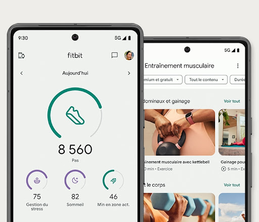 Un téléphone montrant l’app Fitbit à l’écran, avec des exercices et des coachs de fitness