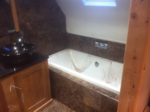 Removing protective film form bath prior to final clean