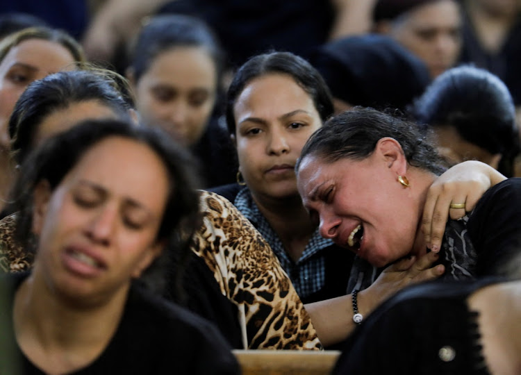 People react during the funeral of victims, inside the Church of the Blessed Virgin Mary at Warraq Al Arab district in Giza Governorate, Egypt, August 14 2022. Picture: MOHAMED ABD EL GHANY/ REUTERS