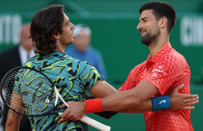 Lorenzo Musetti (L) ended Novak Djokovic's hopes of winning a record-extending 39th ATP Masters 1,000 title in Monte Carlo
