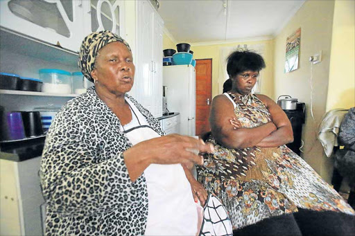 TRAGIC: Joyce Maqabanqa, left, and Pamela Bakawuli are the relatives of five-year-old Zizipho Maqabanqa of Dimbaza who died on Tuesday night after she was stabbed Picture: SINO MAJANGAZA