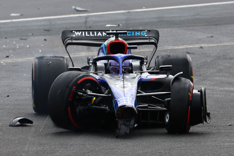 Alexander Albon runs off the track after a crash at the start during the F1 Grand Prix of Great Britain at Silverstone on July 03, 2022 in Northampton, England.