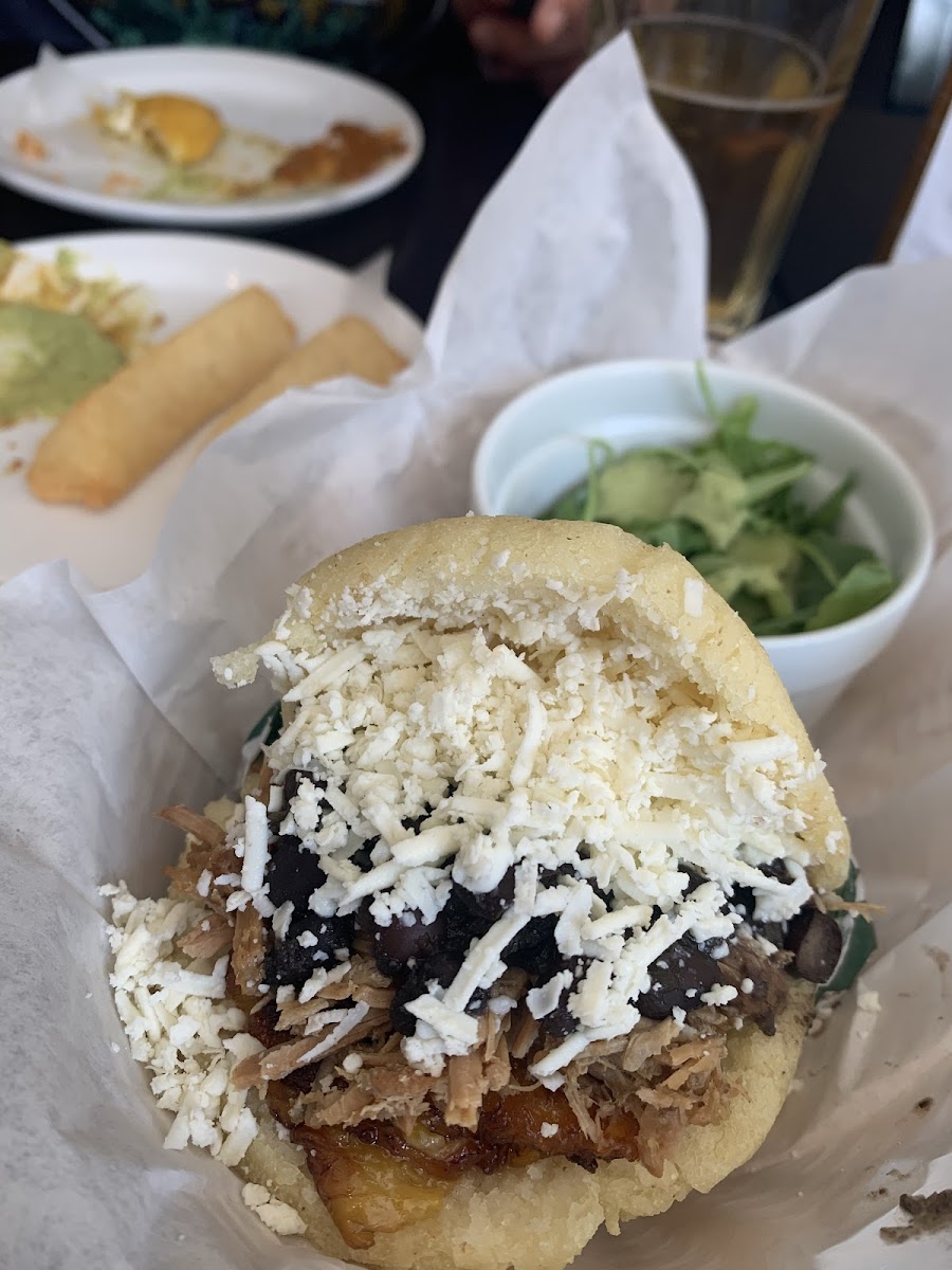 Pork with black beans feta and plantains