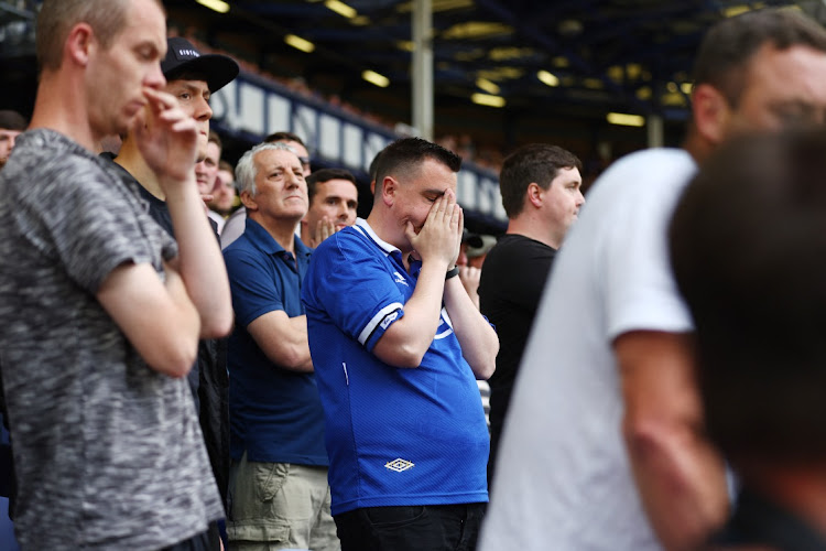 Everton fans react in the stands in the Premier League match against AFC Bournemouth at Goodison Park in Liverpool on May 28 2023.