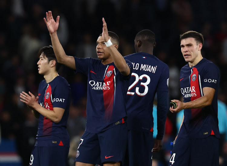 Paris St-Germain's Kylian Mbappe acknowledges fans after their Ligue 1 match against Clermont at Parc des Princes in Paris on Saturday. PSG host Barcelona at the same venue in their Champions League quarterfinal first leg encounter on Wednesday night.