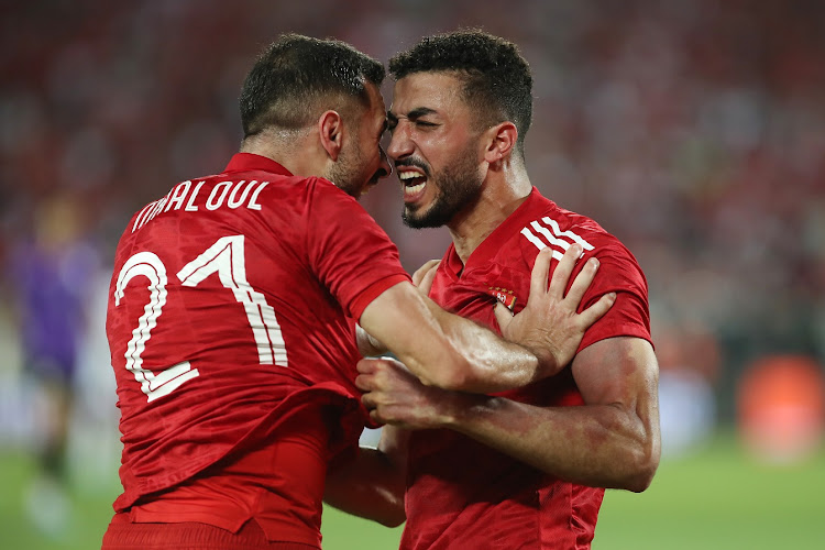 Mohamed Abdelmonem of Al Ahly celebrates his goal with teammate Ali Maloul in the 2022-23 Caf Champions League final second leg against Wydad Athltetic Stade at Mohammed V in Casablanca, Morocco on June 11 2023.