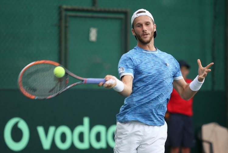 Edan Leshem of Israel in action against Nik Scholtz in the reverse singles during day 2 of the Davis Cup tie between South Africa and Israel at Irene Country Club on February 03, 2018 in Pretoria.