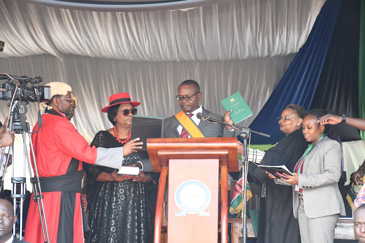 Governor Paul Otuoma during his swearing-in at Busia stadium last year.