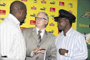 NO FAVOURS: Bafana Bafana coach Gordon Igesund is flanked by his assistants  Serame Letsoaka and Thomas Madigage at the   squad announcement.