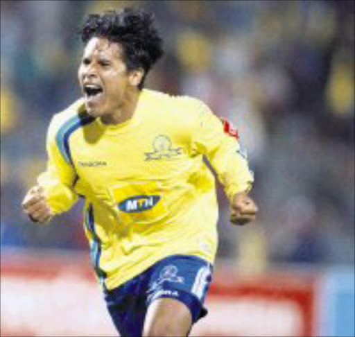 WANTED: Sundowns' Jose Torrealba. 27/06/07. Sowetan. WE'VE DONE IT: Jose Torrealba celebrates after scoring Sundowns' third goal in their 3-1 win over Tembisa Classic. Pic: Sydney Seshibedi. 27/04/06. © SUNDAY TIMES.