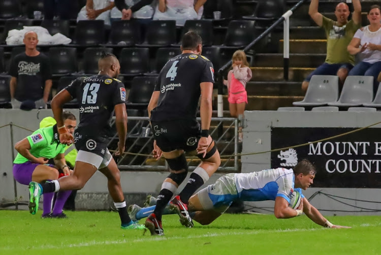 Johnny Kotze of the Vodacom Bulls scores during the Super Rugby match between Cell C Sharks and Vodacom Bulls at Jonsson Kings Park Stadium Stadium.