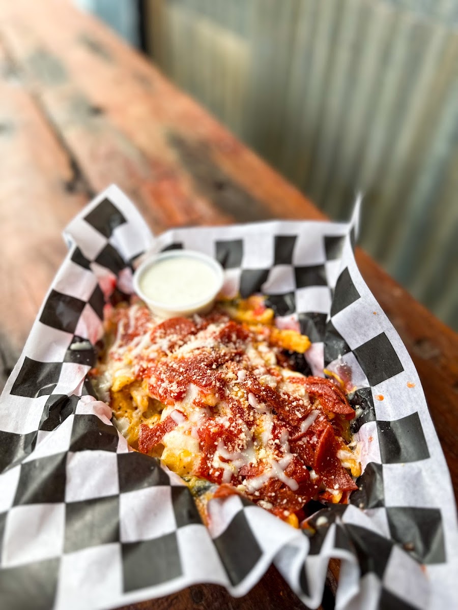 Late Night Menu is available friday and Saturday from 10pm-12 and everything but the buffalo sauce and fried chicken is gluten free. These are the pizza fries!