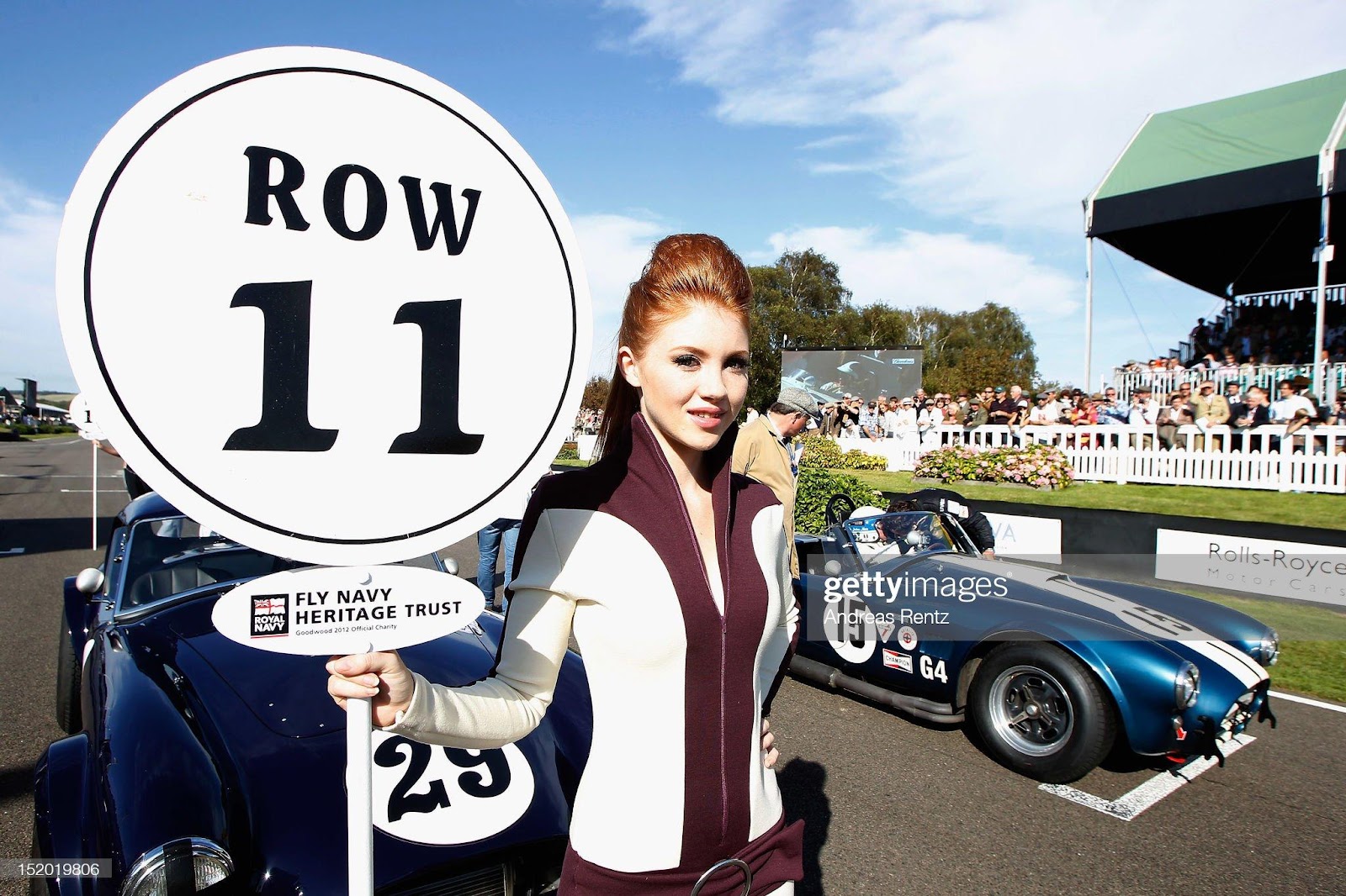 D:\Documenti\posts\posts\Women and motorsport\foto\Getty e altre\grid-girl-stands-next-to-jochen-mass-of-team-meilenwerk-historic-picture-id152019806.jpg