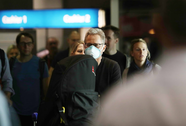 Passengers arrives from Hong Kong at Cape Town International. Picture: SUNDAY TIMES/ESA ALEXANDER