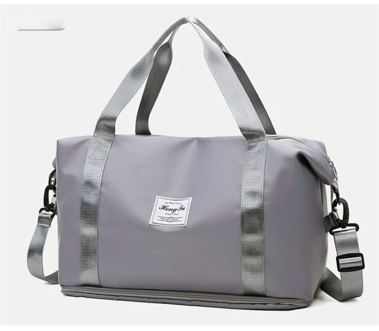 Sac de bagage en tissu Oxford, à la fois simple et tendance. Un bagage léger et élégant, parfait pour voyager avec style et transporter vos effets personnels facilement.
