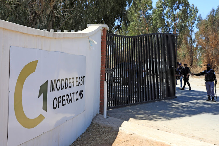 Security has been tightened at the entrance of Gold One Modder East Operations in Springs.