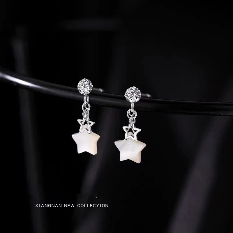Boucles d'oreilles en argent sterling S925 coquillage étoile. Élégantes et discrètes, idéales pour un usage quotidien ou pour sublimer vos tenues.