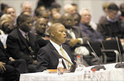 Constitutional Court Judge, Mogoeng Mogoeng makes a statement before the Judicial Services Commission, at the Cape Town International Convention Centre, before his interview for the position of Chief Justice of South Africa begins. Mogoeng has been nominated by SA President Zuma to fill this position. Photo: Rodger Bosch