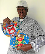 Elliot Mkhize has been weaving with wire since the 1970s.