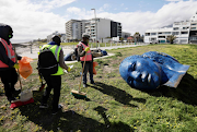 Cape Town's 'Blue Heads' statue was damaged by strong winds this week.