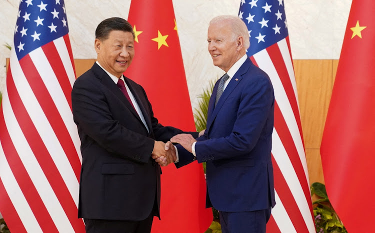 U.S. President Joe Biden shakes hands with Chinese President Xi Jinping as they meet on the sidelines of the G20 leaders' summit in Bali, Indonesia.