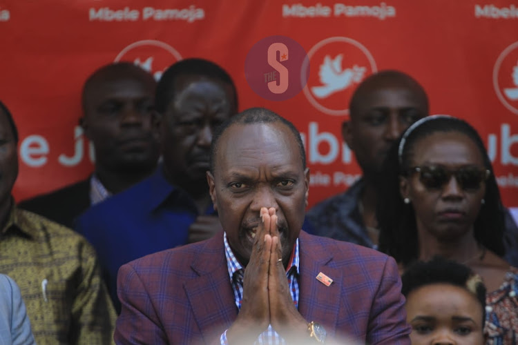 Embattled Jubilee Secretary General Jeremiah Kioni, Opposition Chief Raila Odinga and Narc Kenya's Martha Karua at a press briefing in Kileleshwa on February 16, 2023