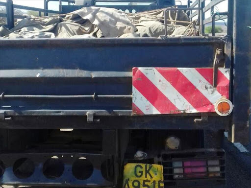 A truck loaded with bags of charcoal after it was impounded by forestry officers on Sunday, September 9, 2018. /KURGAT MARINDANY