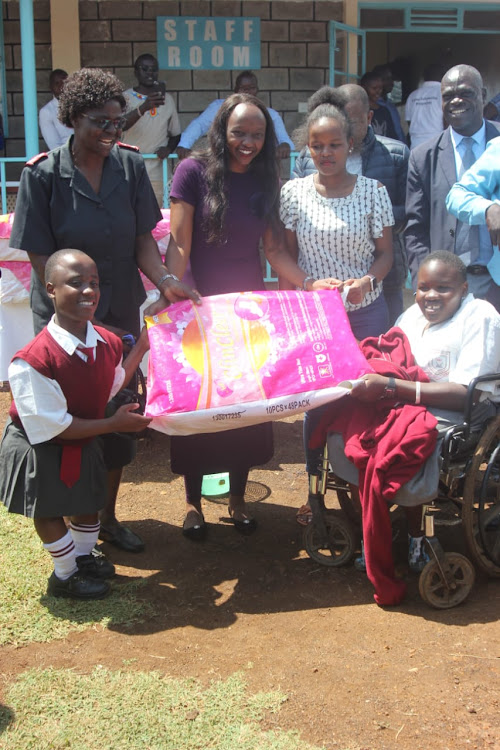 President William Ruto’s daughter Charlene Ruto donates sanitary pads to female students at Joyland Special Secondary School in Kisumu on Monday.