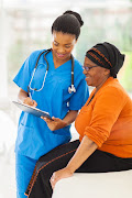 Nurse with elderly patient