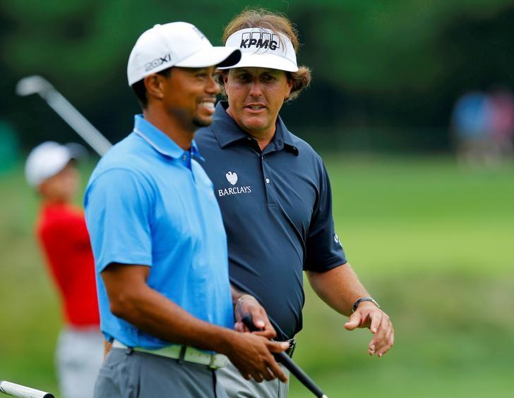 Tiger Woods and Phil Mickelson during a past match