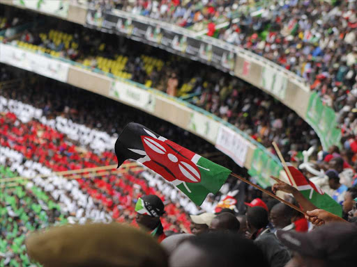 A Kenyan flag is seen during the Kenya @ 50 celebration at the Kasarani Stadium during this year's Jamuhuri day in 2013 Photo/File