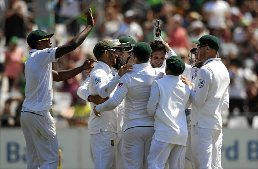 South African players celebrate a dismissal of a Sri Lankan batsman during the second test at Newlands Cricket Stadium in Cape Town. File photo