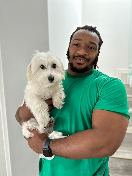 Stormers rugby star Joseph Dweba with his dog.