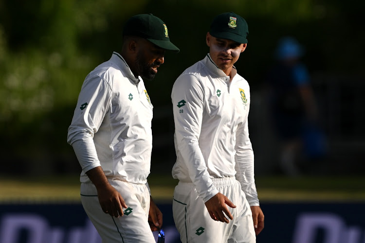 Dane Piedt and David Bedingham of South Africa walk off during day three of the Men's Second Test in the series between New Zealand and South Africa at Seddon Park on February 15, 2024 in Hamilton, New Zealand.